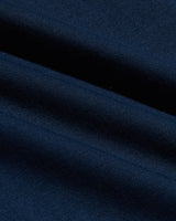 Close-up of soft navy fabric texture showing fine knit detail and subtle folds of the Navy Pima Cotton Blend Crew men's basics garment.